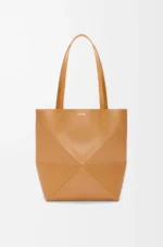 Medium Puzzle Fold tote in shiny calfskin